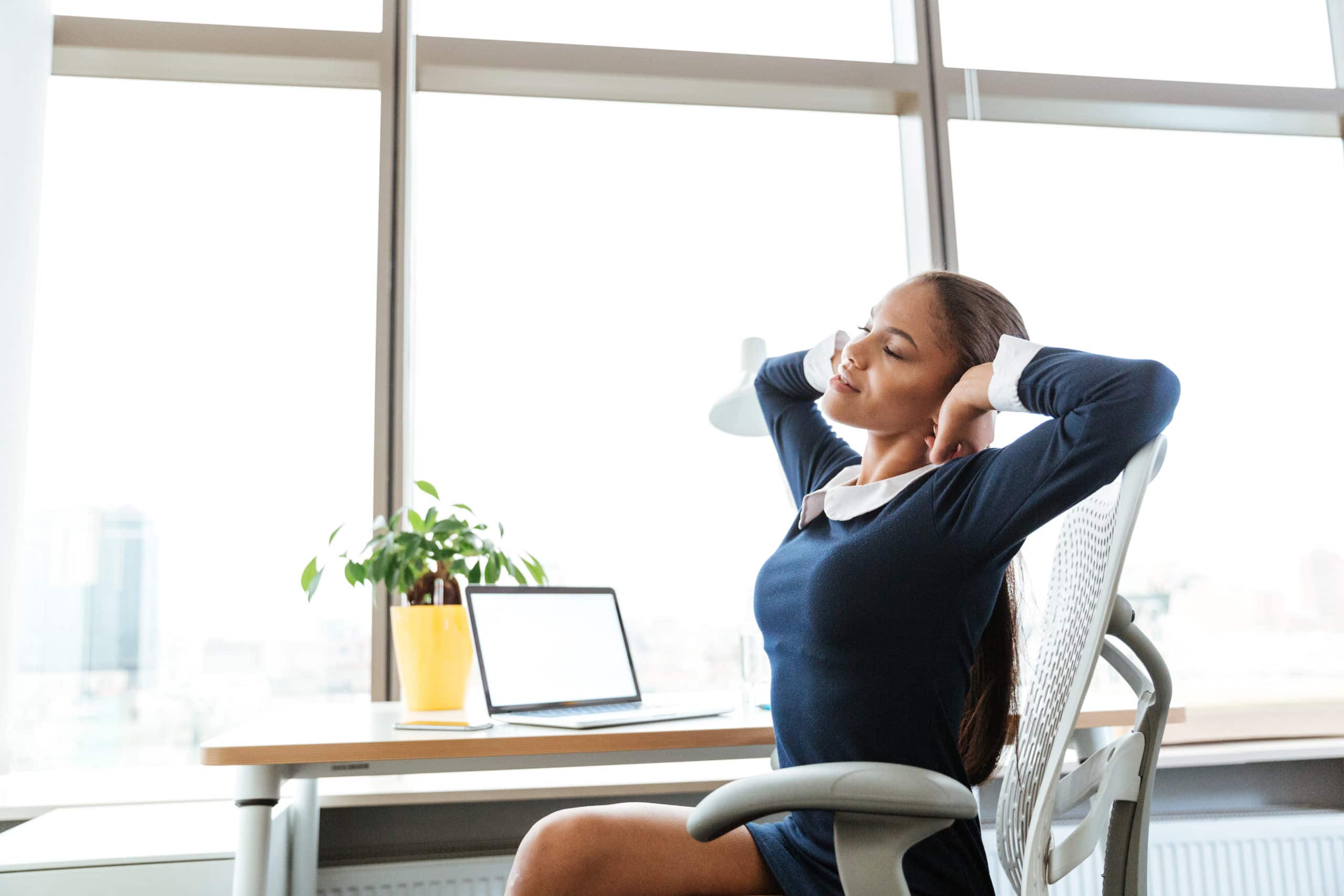 Side view business woman stretching